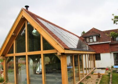 Renewable energy system including solar, heat pump and underfloor heating