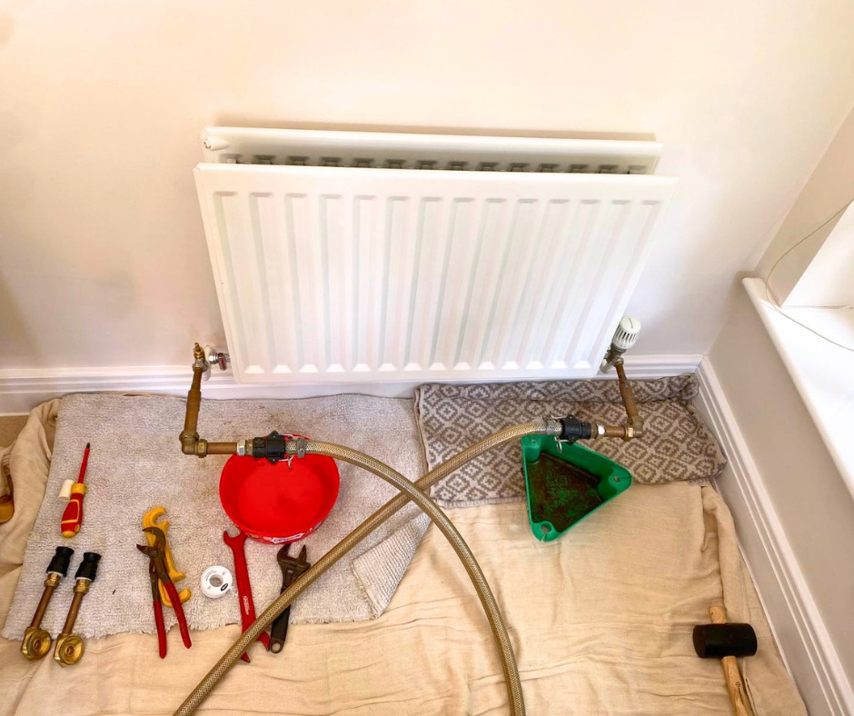 Powerflushing radiator before a boiler installation by Heppelthwaite - Red Van Plumbers