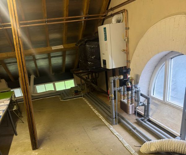 Vaillant ecoTEC Plus boilers and Megaflo cylinder installed in the loft plant room